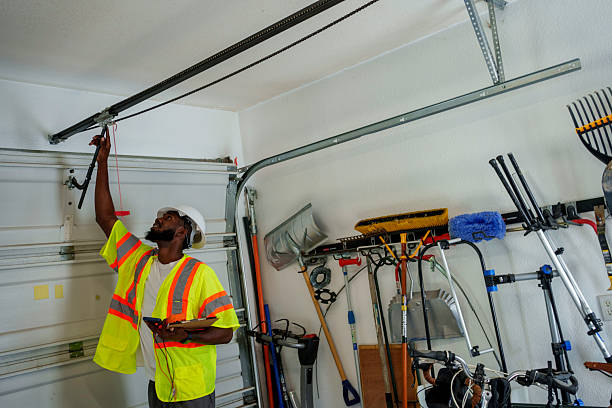 Professional Garage Door Panel Replacement technician working in Carnegie, OK